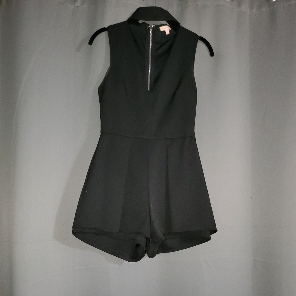 Flirty romper with choker neckline!